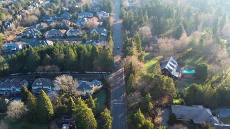 4k aerial morning drone shot overlooking pacific northwest road