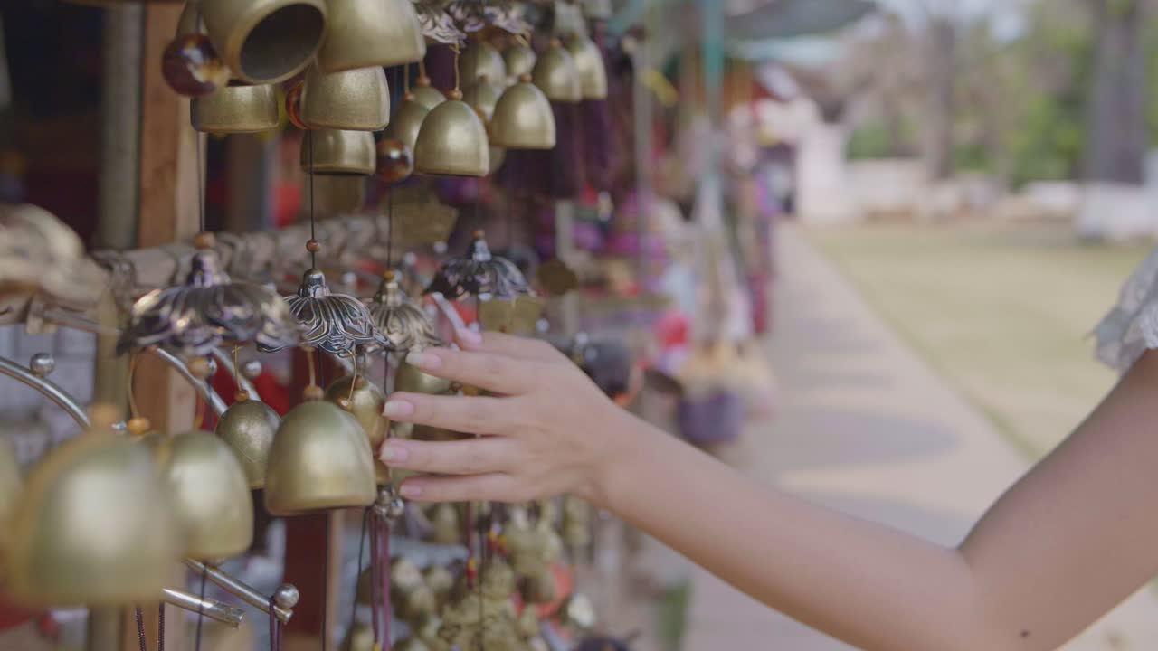 Hand Touching Bells , Slow Motion