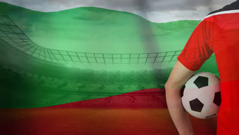 soccer player and bulgarian flag against football stadium