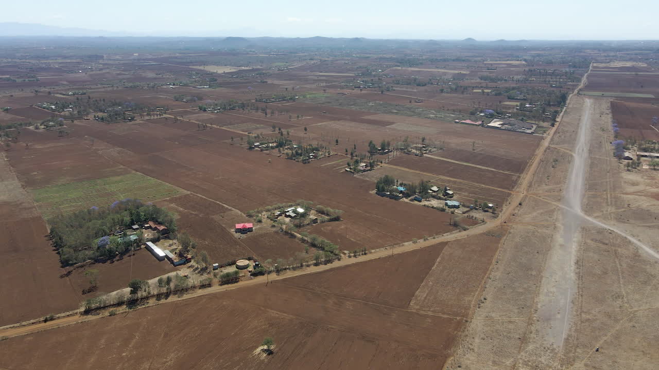 Aerial pan of an old and deserted airstrip in rural Kenya