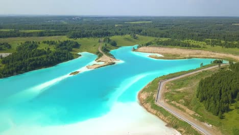 drone flying forward over a nuclear poisonous lake near novosibirsk, siberian maldives, russia