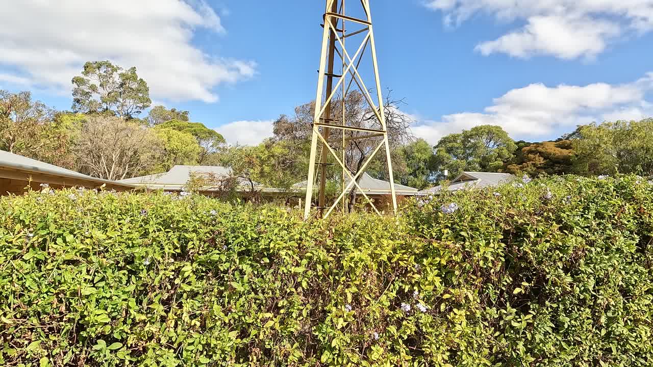 Old Windmill under a Blue Sky