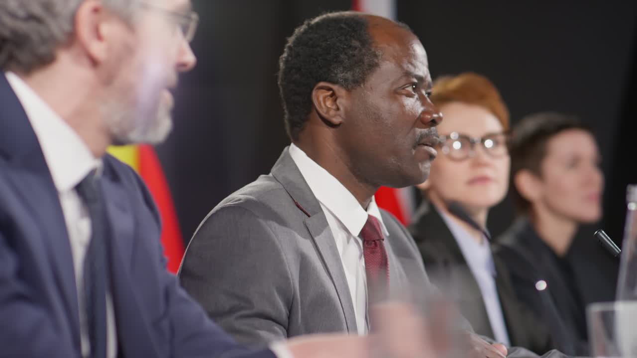 African American Diplomat Holding Speech at Press Conference