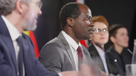 african american diplomat holding speech at press conference