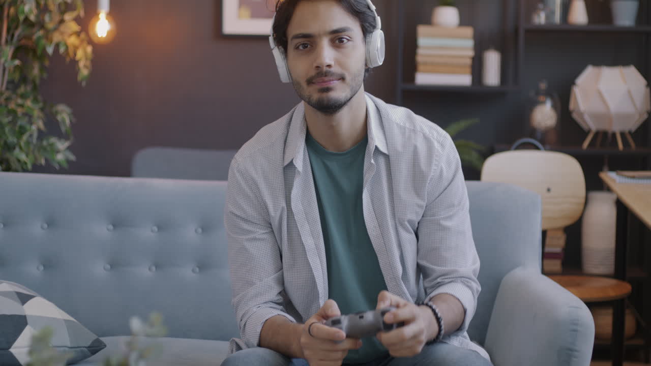 Man Playing Video Games at Home