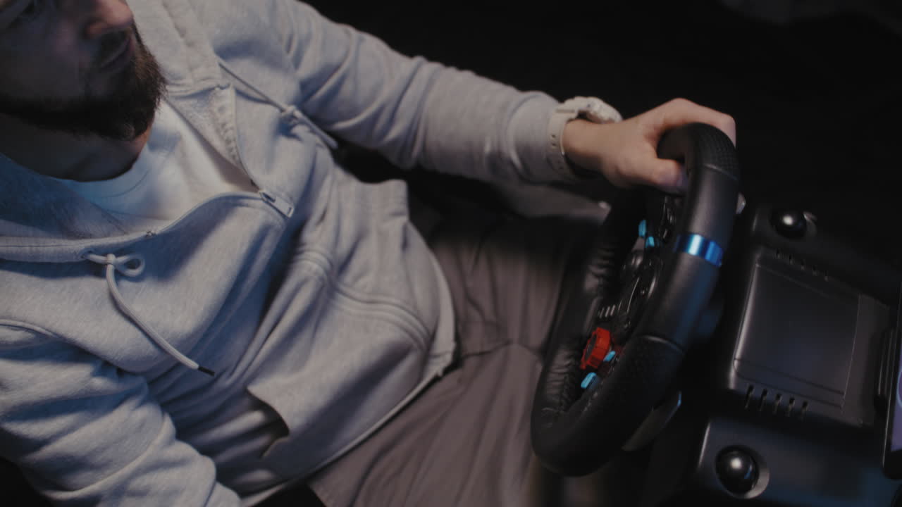 Man Playing Racing Video Game