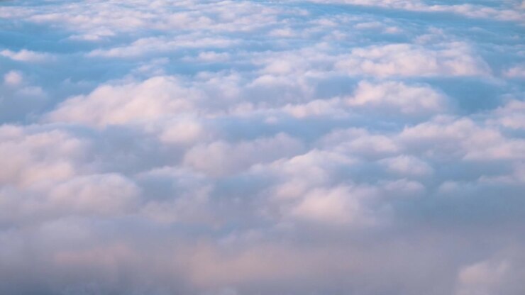 Close up of clouds from above - 4K 60fps