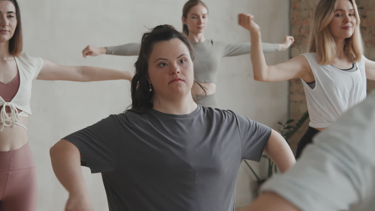 Young Woman With Down Syndrome At Group Fitness Class
