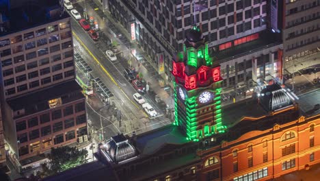 Bird-Eye-View-Time-Lapse-of-Flinders-Street-Railway-Station-Elizabeth-Street-Entrance,-Melbourne,-Victoria,-Australia-During-Christmas-Shot-from-Eureka-Tower-Zoom