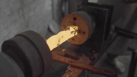 metal forging, hot spinning on a lathe during production