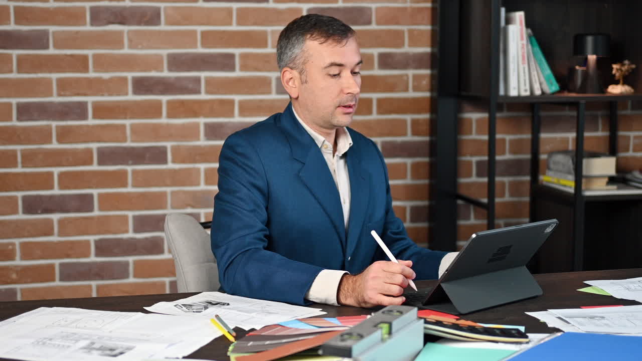 Man talking on a web conference at an office