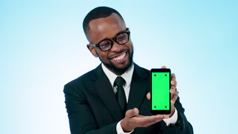 happy businessman, phone and pointing with green