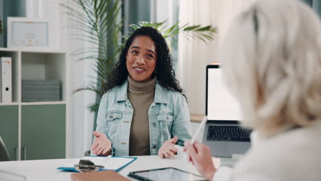woman enthusiastically presenting ideas in a meeting
