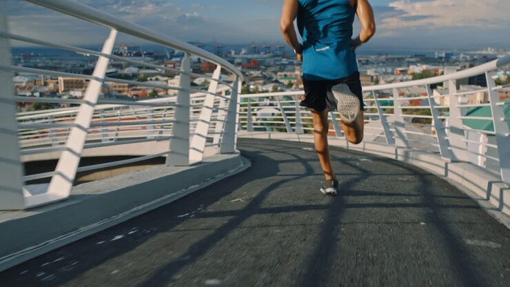 Man, legs or running on city bridge for healthcare