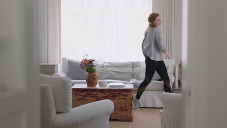 happy-young-woman-dancing-at-home-having-fun-celebrating-with-funny-dance-moves-enjoying-freedom-on-weekend-4k-footage