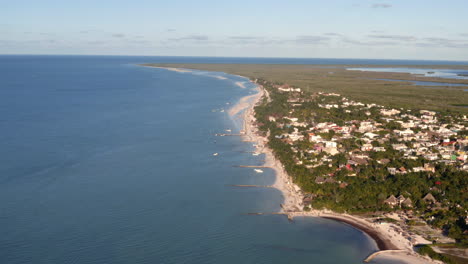 Caribbean-coastline-with-small-town-and-sandy-beaches-in-Mexico