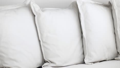 white pillows on a bed