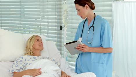 doctor speaking with her patient