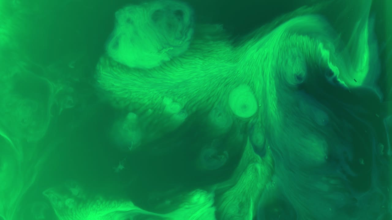 fondo verde abstracto de colores psicodélicos pintando en movimiento