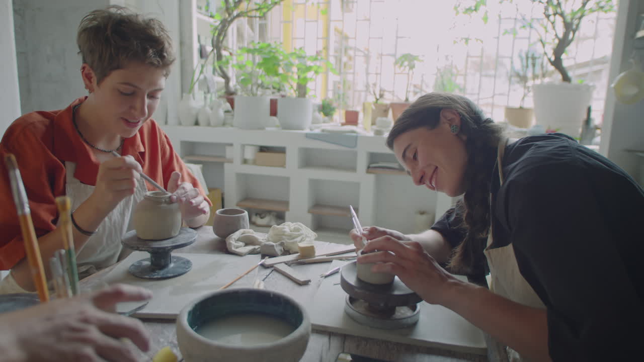 Female Friends Chatting during Pottery Masterclass