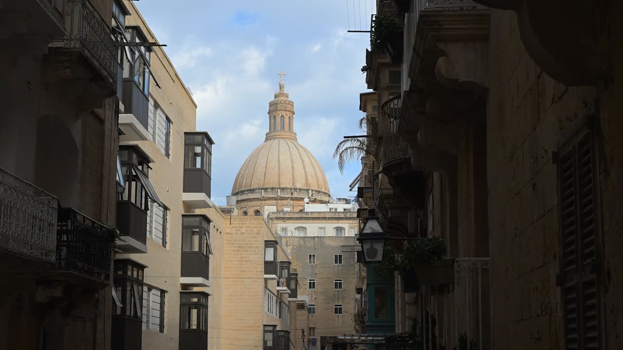 A grand cathedral located in the heart of Malta, showcasing magnificent architecture, cultural heritage, and the island’s enduring faith and artistry