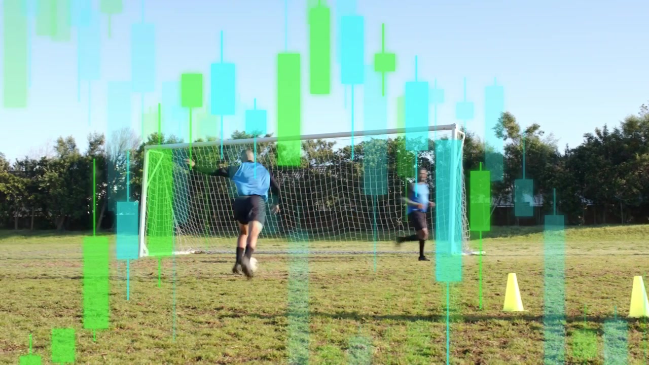 Soccer striker starting dribble through cones, firing training shots at goal while keeper saving