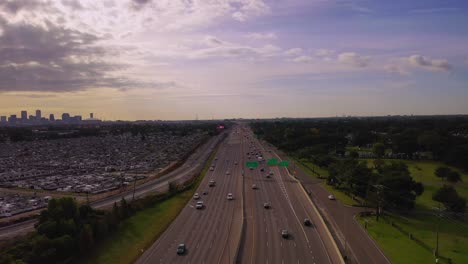 droning above interstate i-10 with the city of new orleans in the back ground