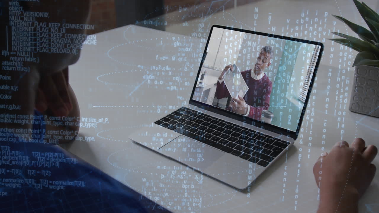 Person watching online tutorial on laptop with digital code overlay animation