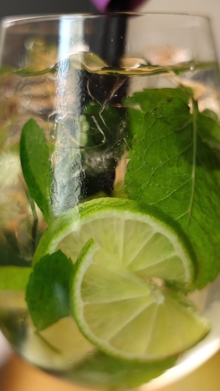 Refreshing Mojito Cocktail with Lime and Mint in a Glass
