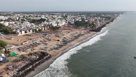 sweeping shot of the city meeting the sea, showcasing a peaceful coastal lifestyle