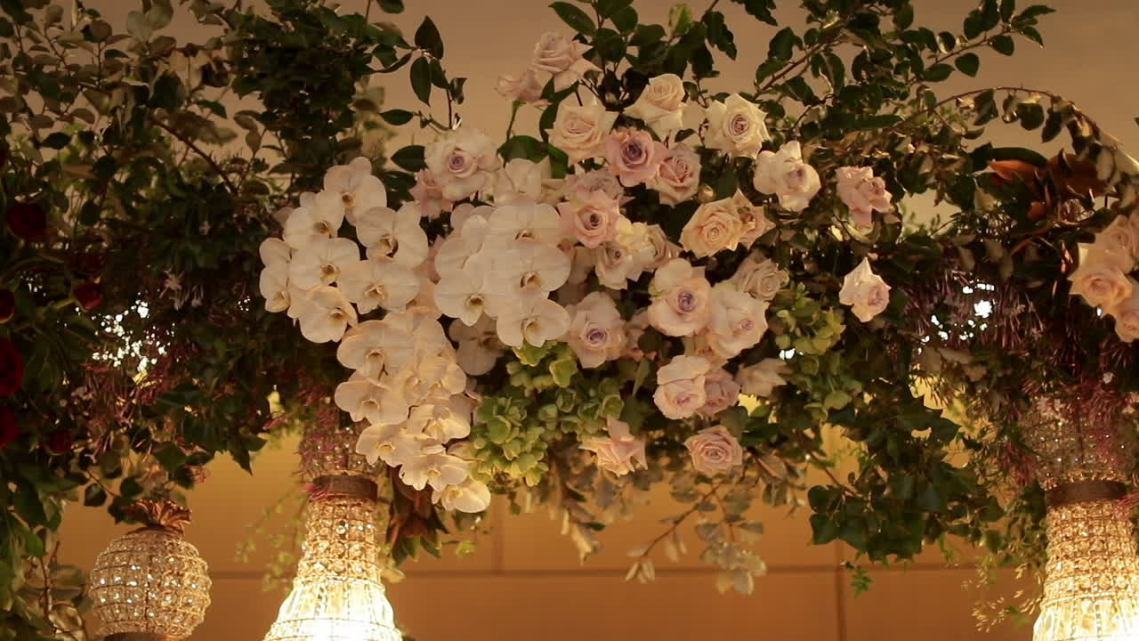 White orchid - blush rose flower arrangement, panning shot