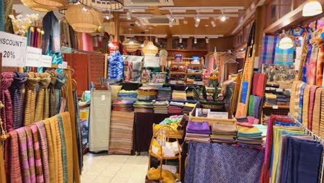 vibrant textiles displayed in a bustling market