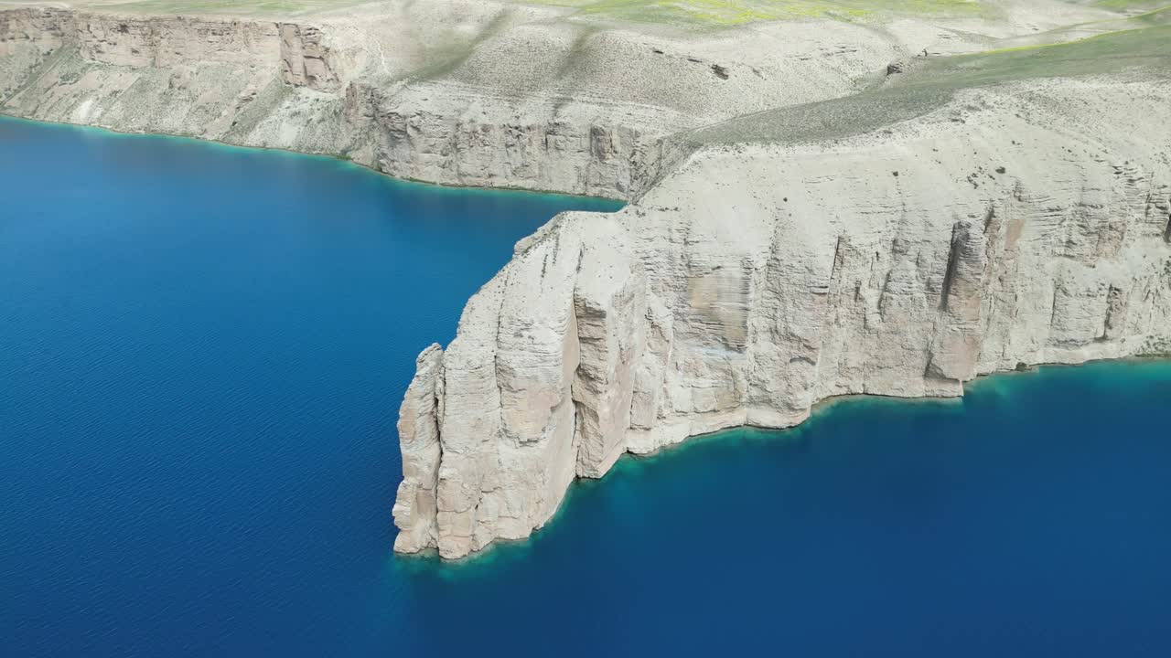 Band E Amir Drone Aerial, Afghanistan. Pristine turquoise lake oasis, lush trees in desert landscape