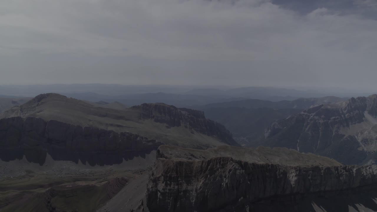 This drone video features a stunning frontal descriptive shot flying over the majestic mountains of Pico del Castillo d’Acher in the Aragonese Pyrenees, Spain, showcasing breathtaking natural beauty.