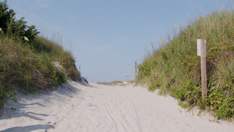 beach driving access point with dunes on both sides