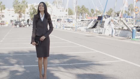 Business-Woman-Stand-In-Yacht-Club