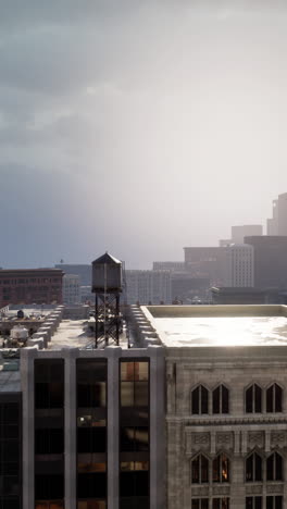 a water tower on top of a building in a city