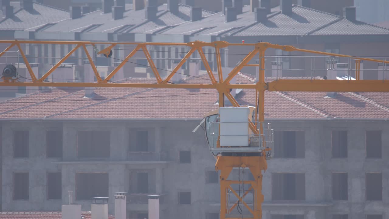 Construction crane above a construction site