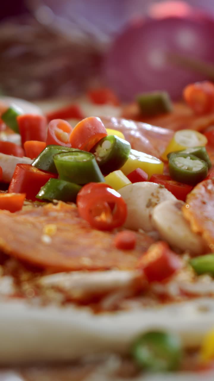 Making pizza with peppers