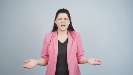 business woman looking at camera in amazement.