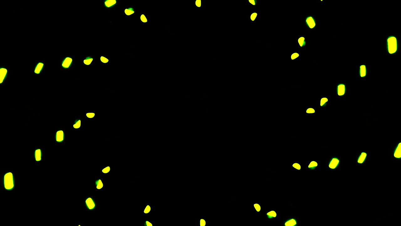 Abstract Yellow Dots Pattern on Black Background