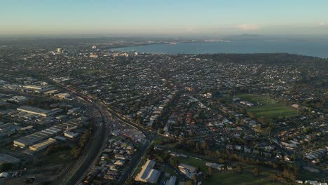 Birds-eye-view-over-Geelong-city-and-bay-in-Australia-at-sunset