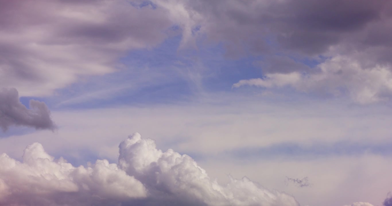 Moving Clouds in a Dynamic Blue and Grey Sky