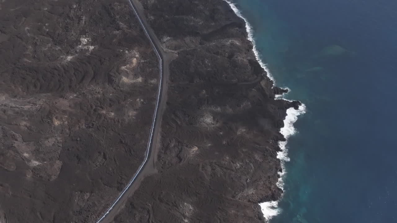 Volcanic Coastline with Pipeline