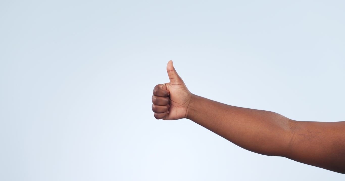 Person, hand and thumbs up on mockup space
