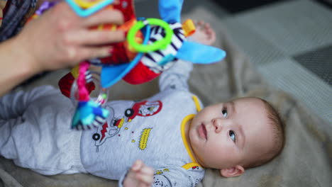 baby playing with a toy