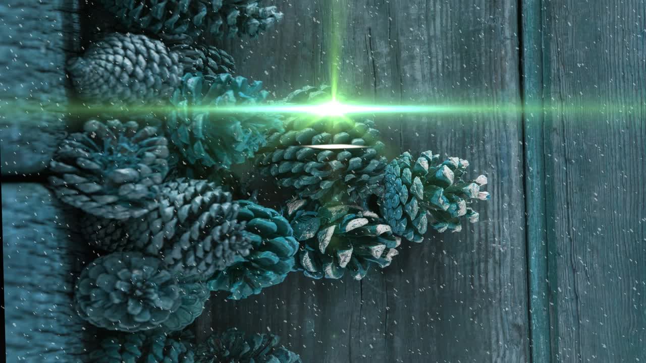 Animation of light moving over pine cones on wooden surface