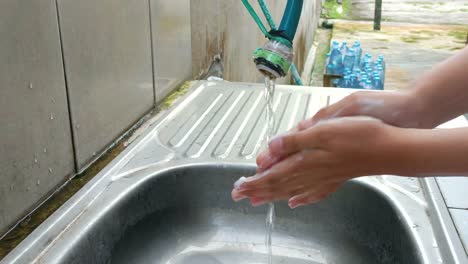 close-up-of-soaping-both-hands