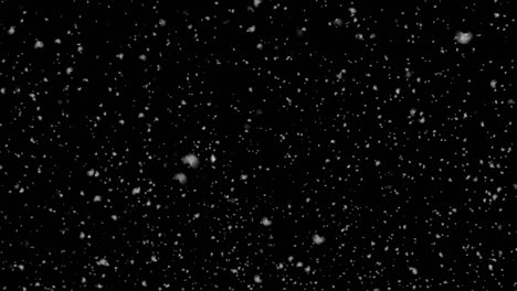 nieve realista aislada cayendo sobre un fondo negro