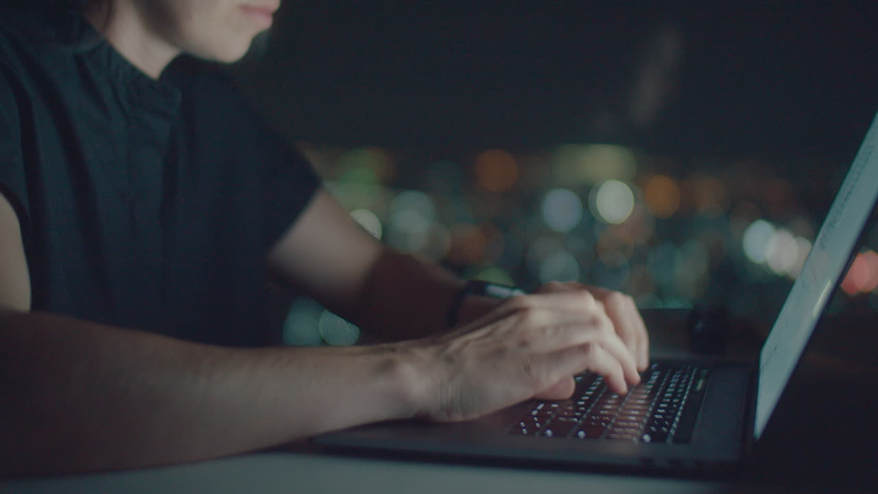 White girls hands typing text at night